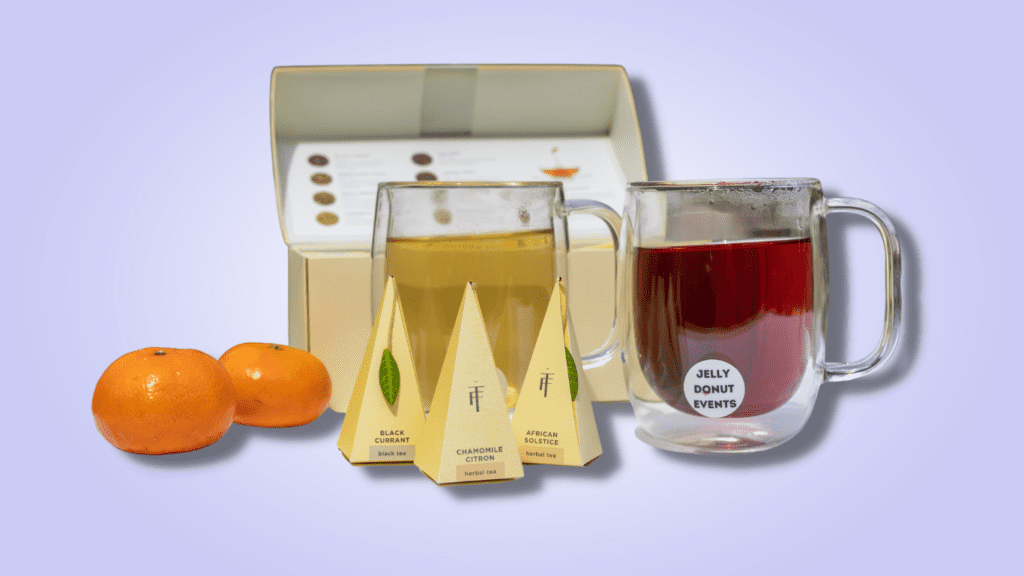 Tea tasting kit for virtual events. Tea in cups, tea boxes and mandarins